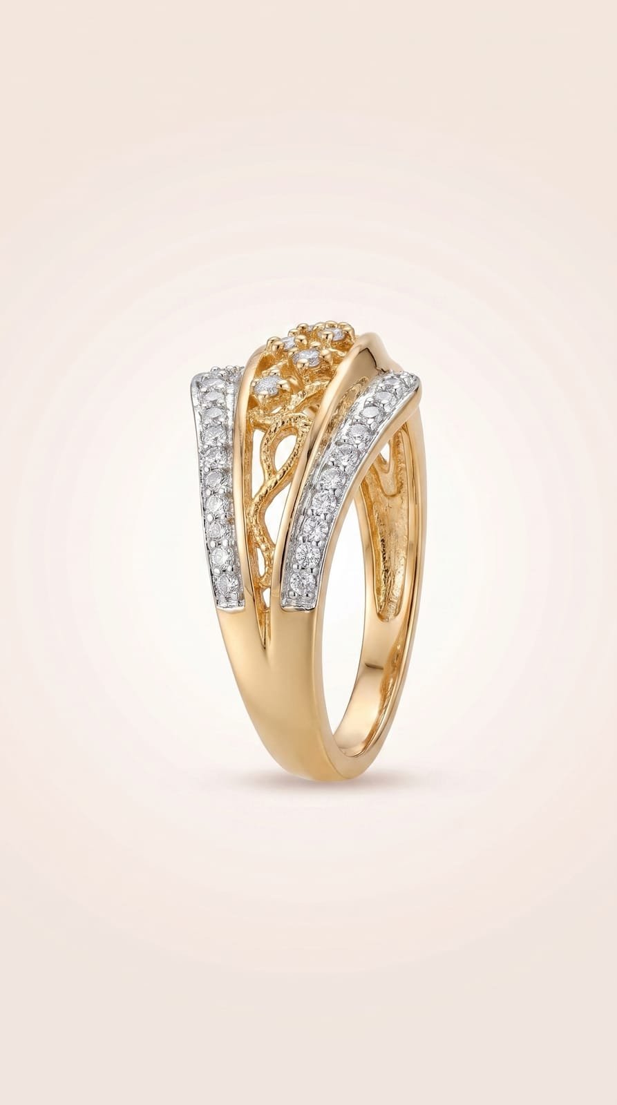 Three-quarter view of a gold crossover ring set with pavé diamonds