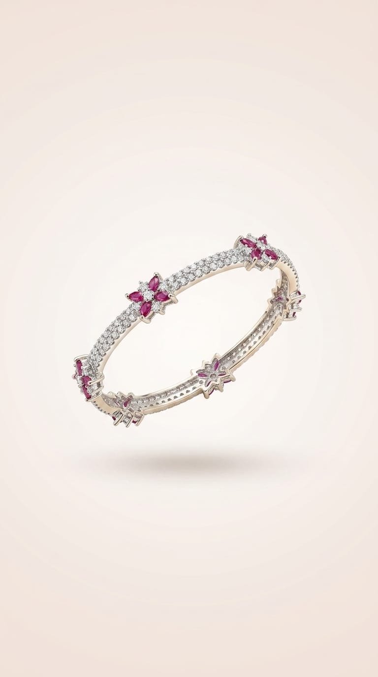 Angled view of the floral pavé bangle on an ivory background